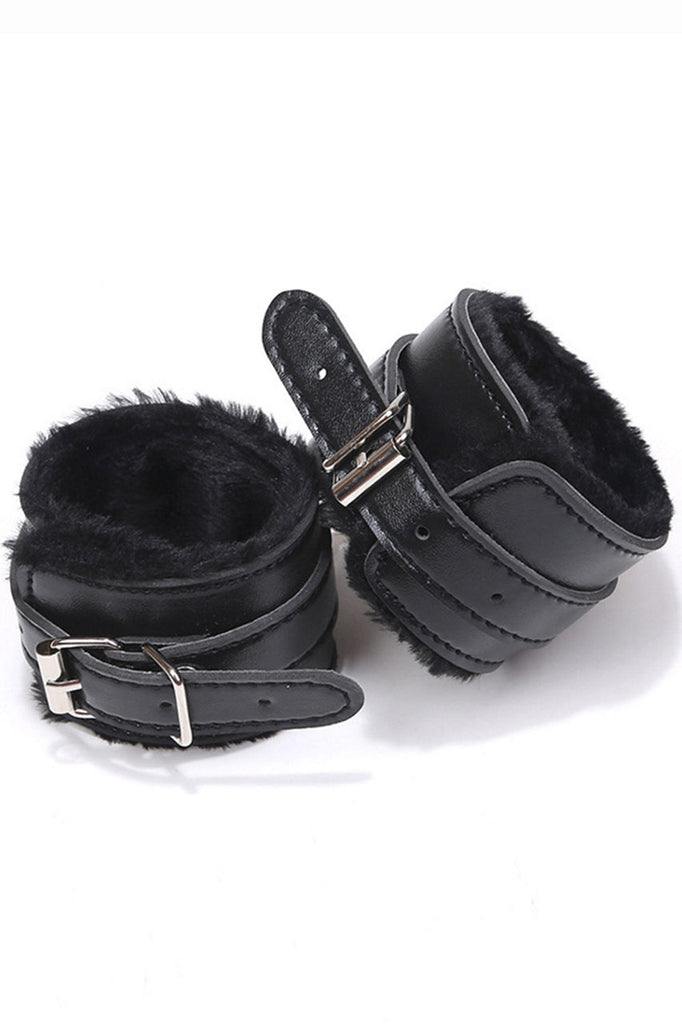 Shop these faux black leather wrist cuffs with adjustable buckles