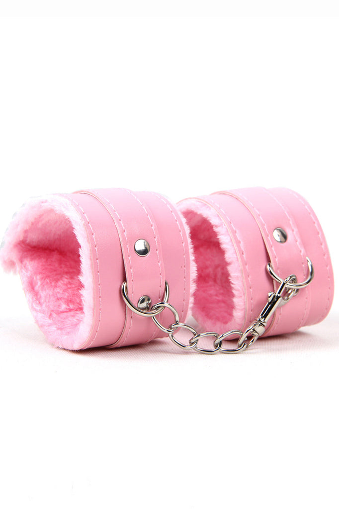 Shop these faux pink leather wrist cuffs for your dominatrix outfit