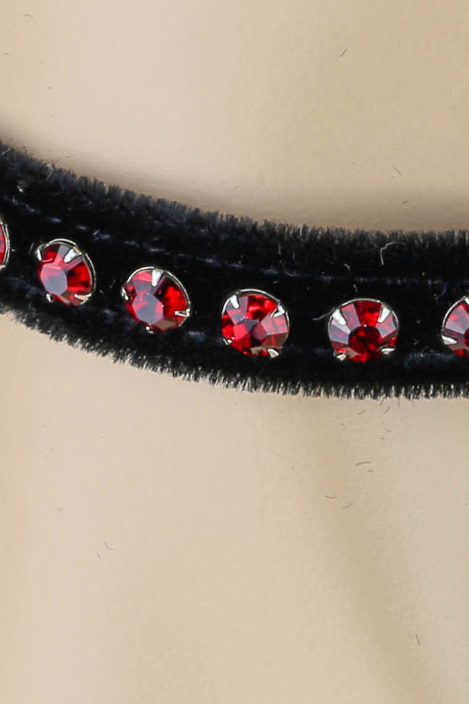 Shop this women's choker that features a black velvet choker with red rhinestones
