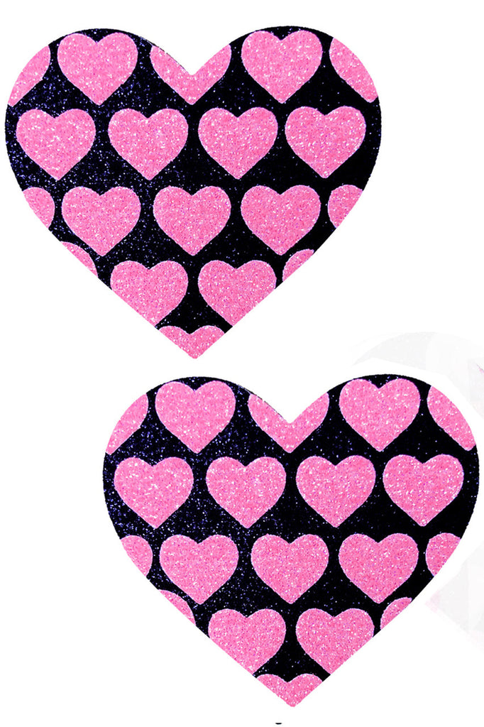 Shop these women's UV reactive black glitter nipple pasties with neon pink hearts