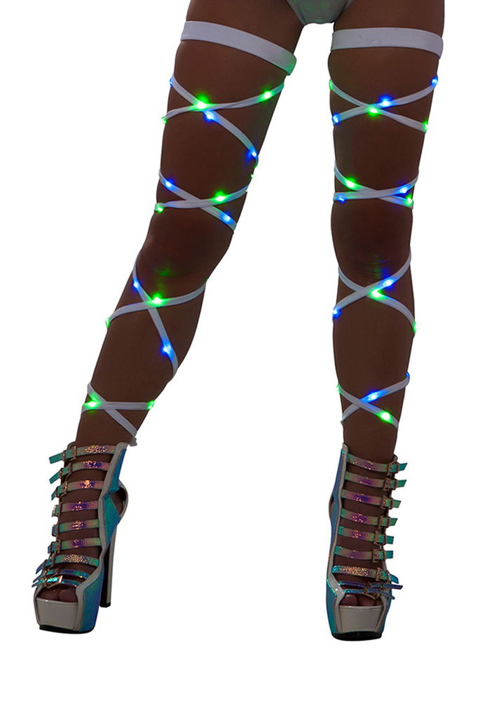 Women's blue and green LED lights woven in to white leg wraps.  J. Valentine Product.