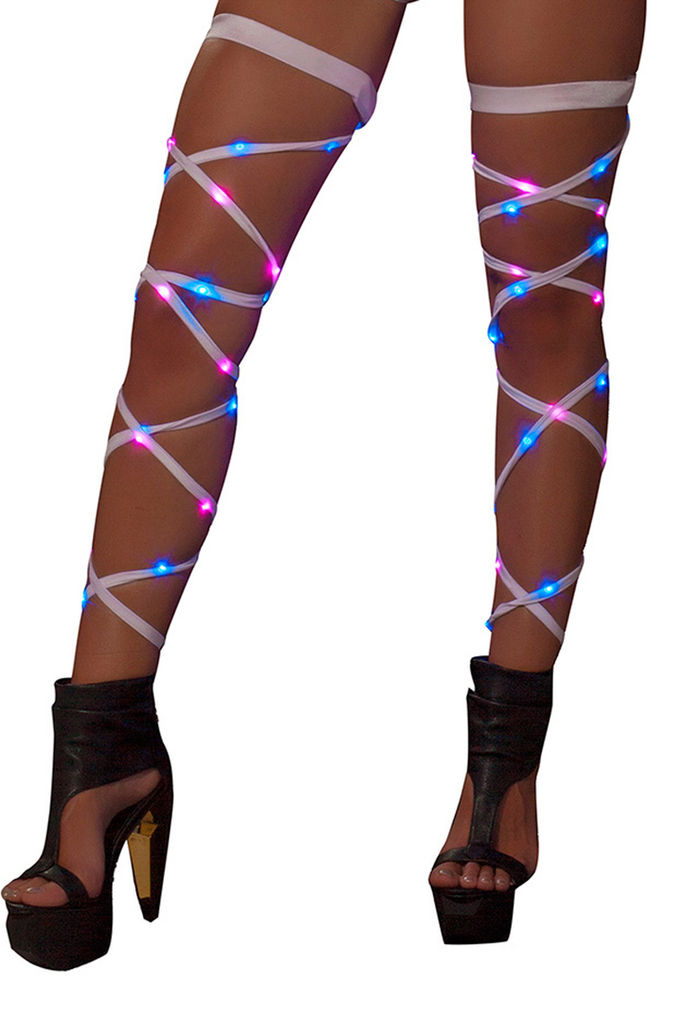 Women's pink and blue LED lights woven into white leg wraps.  J. Valentine product.