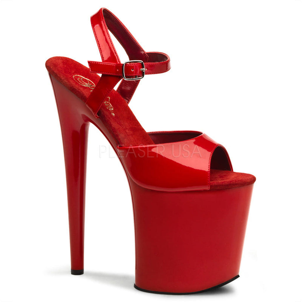 Women's red ankle strap stripper heels with 8" heel.